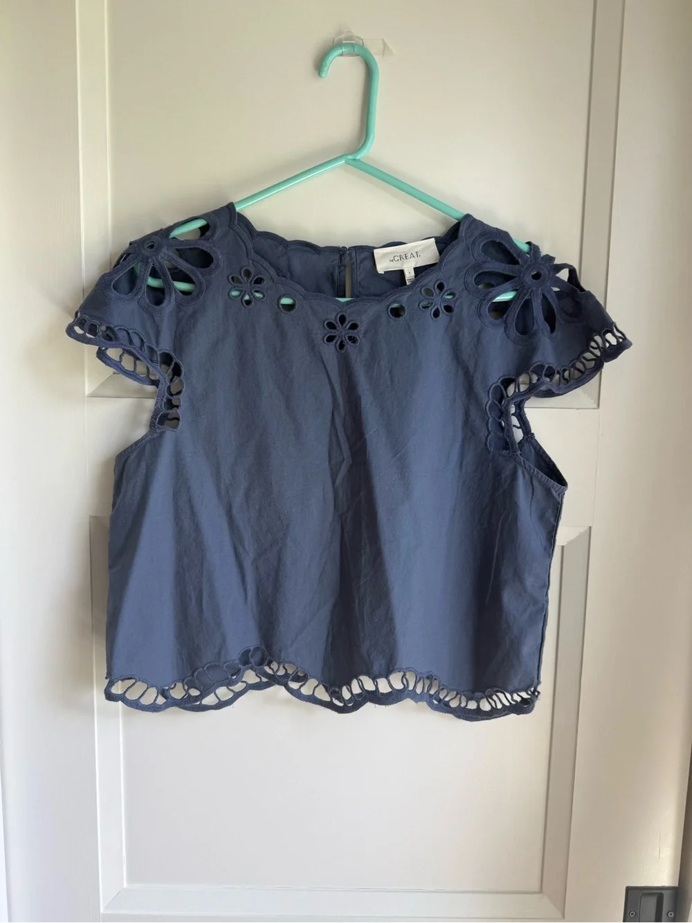 THE GREAT. Navy Eyelet Flutter Sleeve Blouse